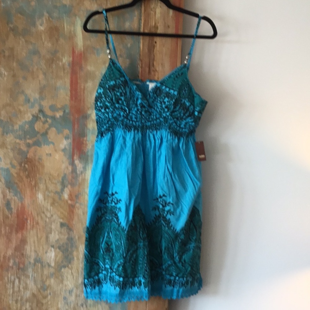 Turquoise and black dress